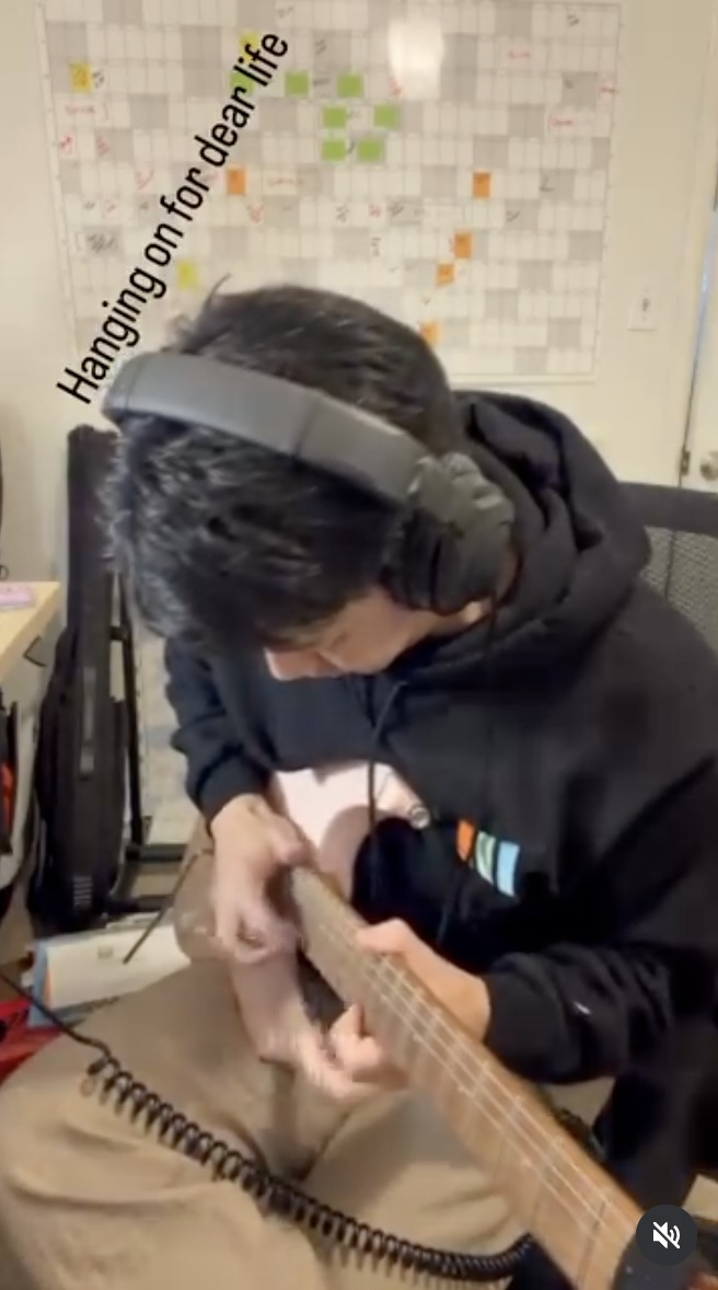 Aaron playing an electric guitar, Instagram reel thumbnail