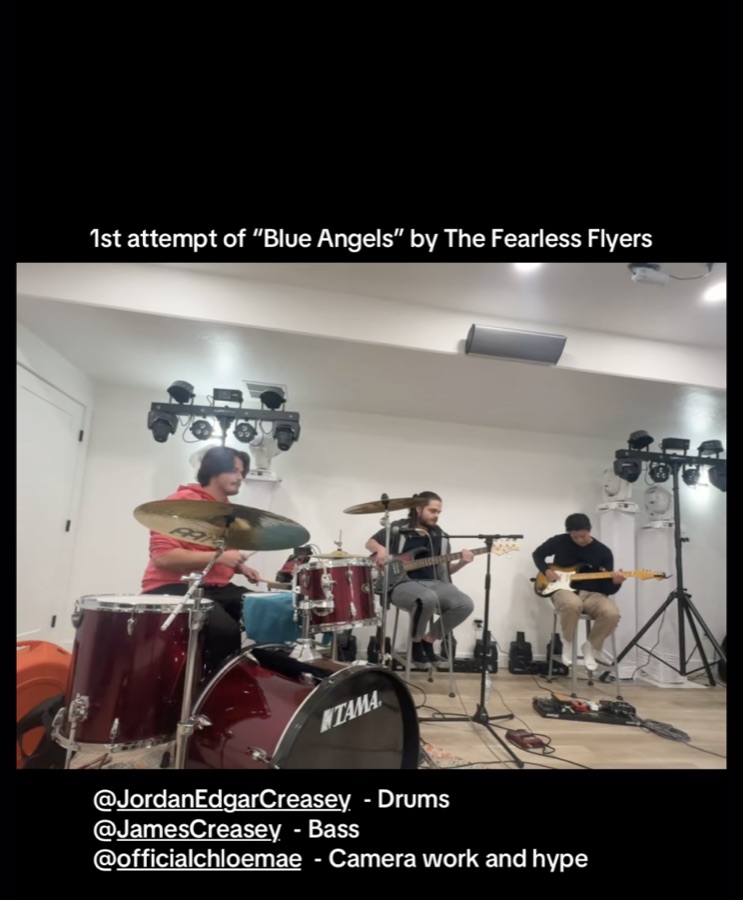Aaron playing guitar with his band, TikTok video thumbnail